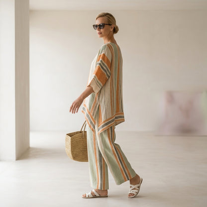 Elisabetta – top asimétrico elegante con pantalones de pierna ancha