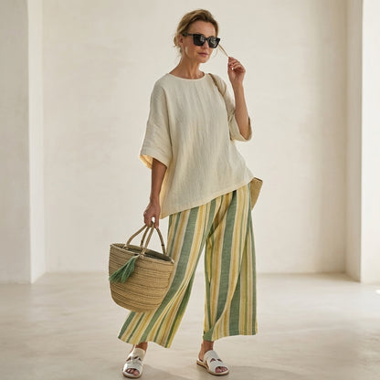 Caterina – an elegant top and striped linen trousers for a chic and sophisticated look
